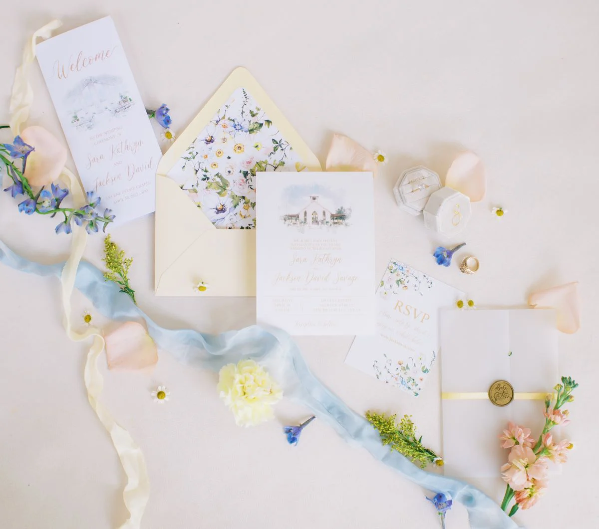 The invitation suite she designed herself, lined in wildflowers