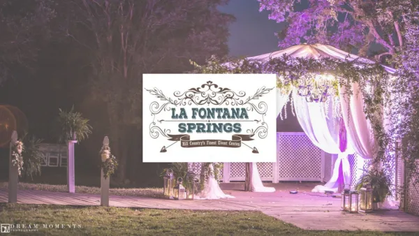 The La Fontana Springs sign in front of a draped gazebo lit with a chandelier at night