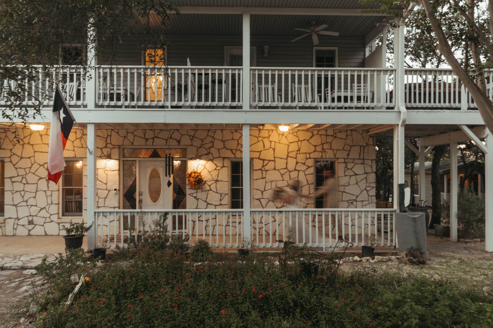 Front view of a two-story overnight wedding accommodations lodging property.