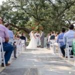 A aisle shot of a wedding ceremony from a Hill Country wedding planner's perspective