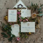 4 different wedding cards, invitations, and save the date cards
