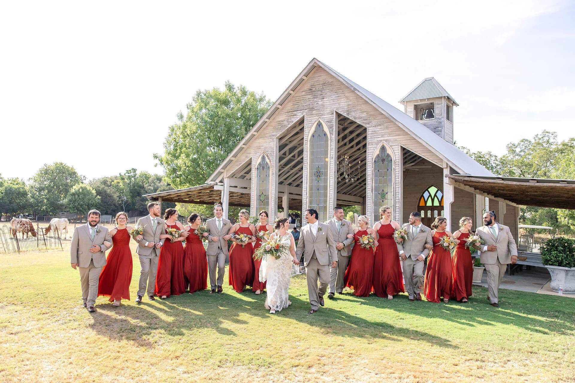 Wedding party in front of one of the Gruene Estate Accommodations wedding locations