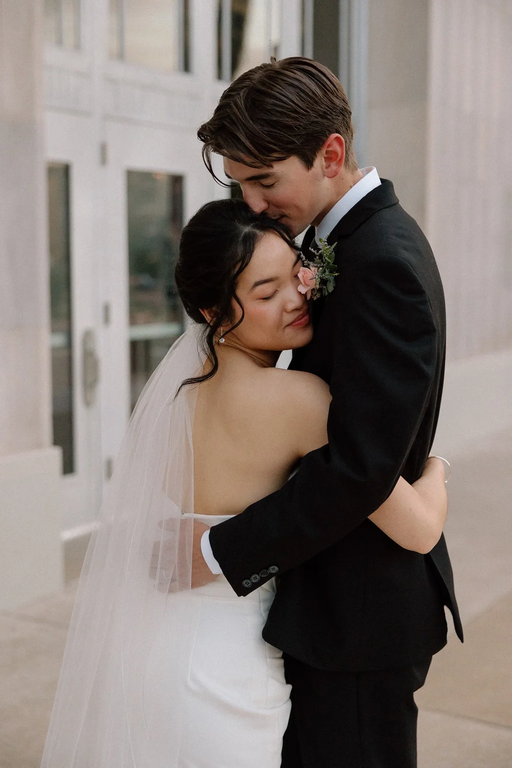 Merribelle and Gabriel embrace outside the Civic Center Music Hall in Oklahoma City