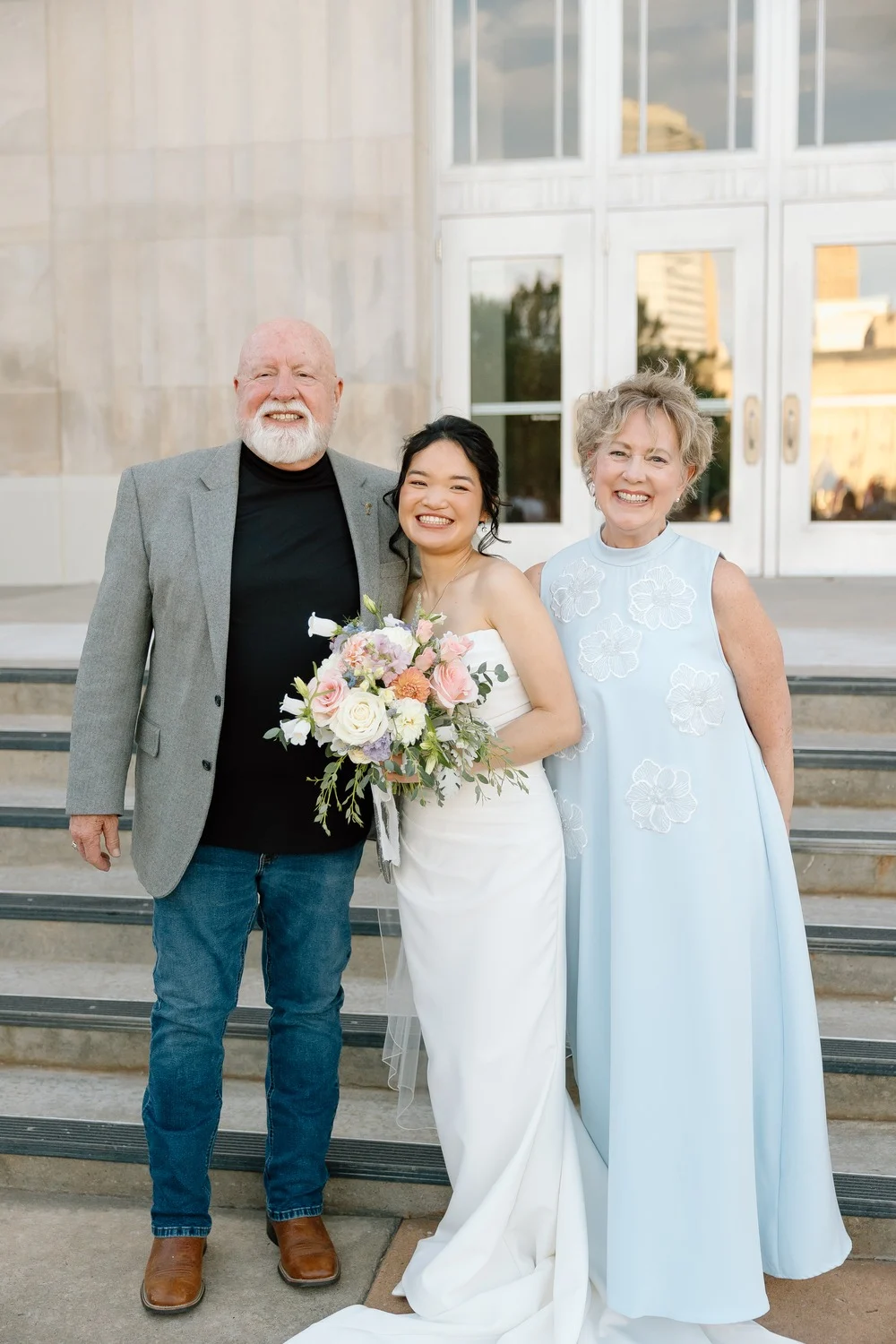 Merribelle with family on the steps outside the Civic Center Music Hall